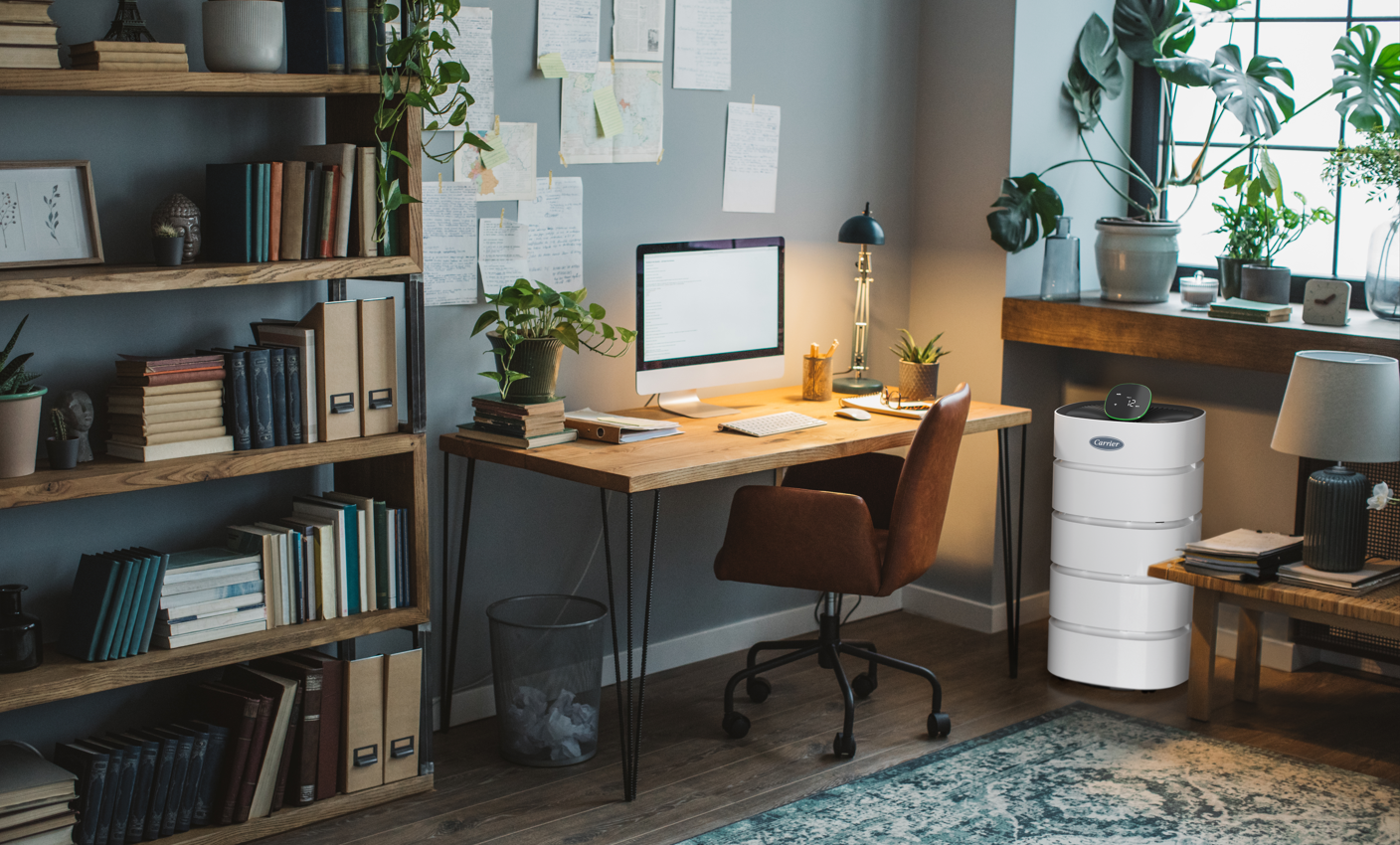 Home office displaying an air purifier to explain how to improve indoor air quality