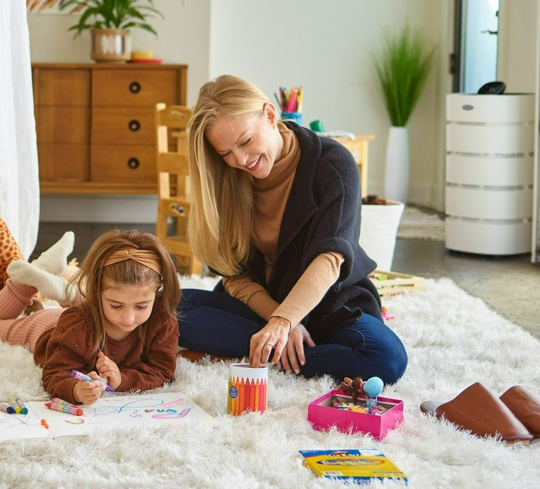 Carrier Smart Air Purifier home display mom and daughter on floor